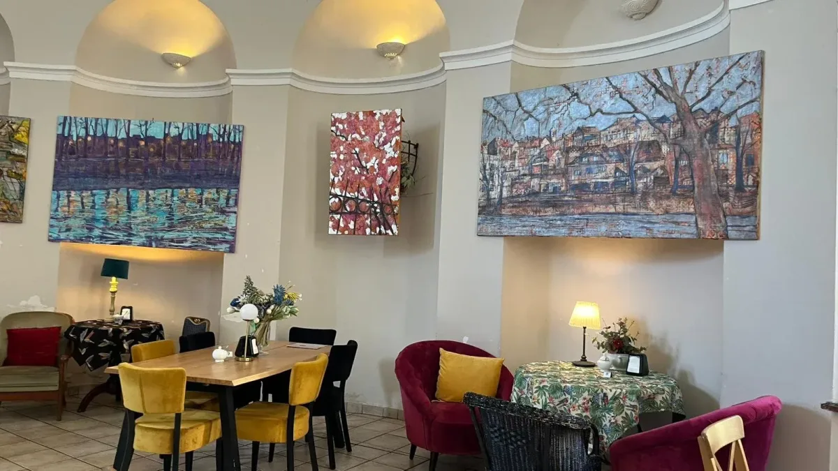 Paintings by Monika Ślósarczyk installed in Cafe Muzeum.